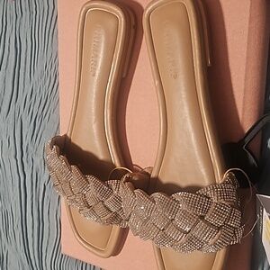 Gold colored shiny sandals